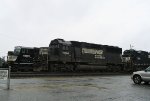 NS 7104 leads train 214 in the rain